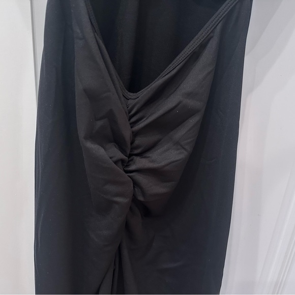 Trendy,  Backless Jumpsuit  Bodysuit with Flared Legs in Size Sm in Black - Picture 7 of 16